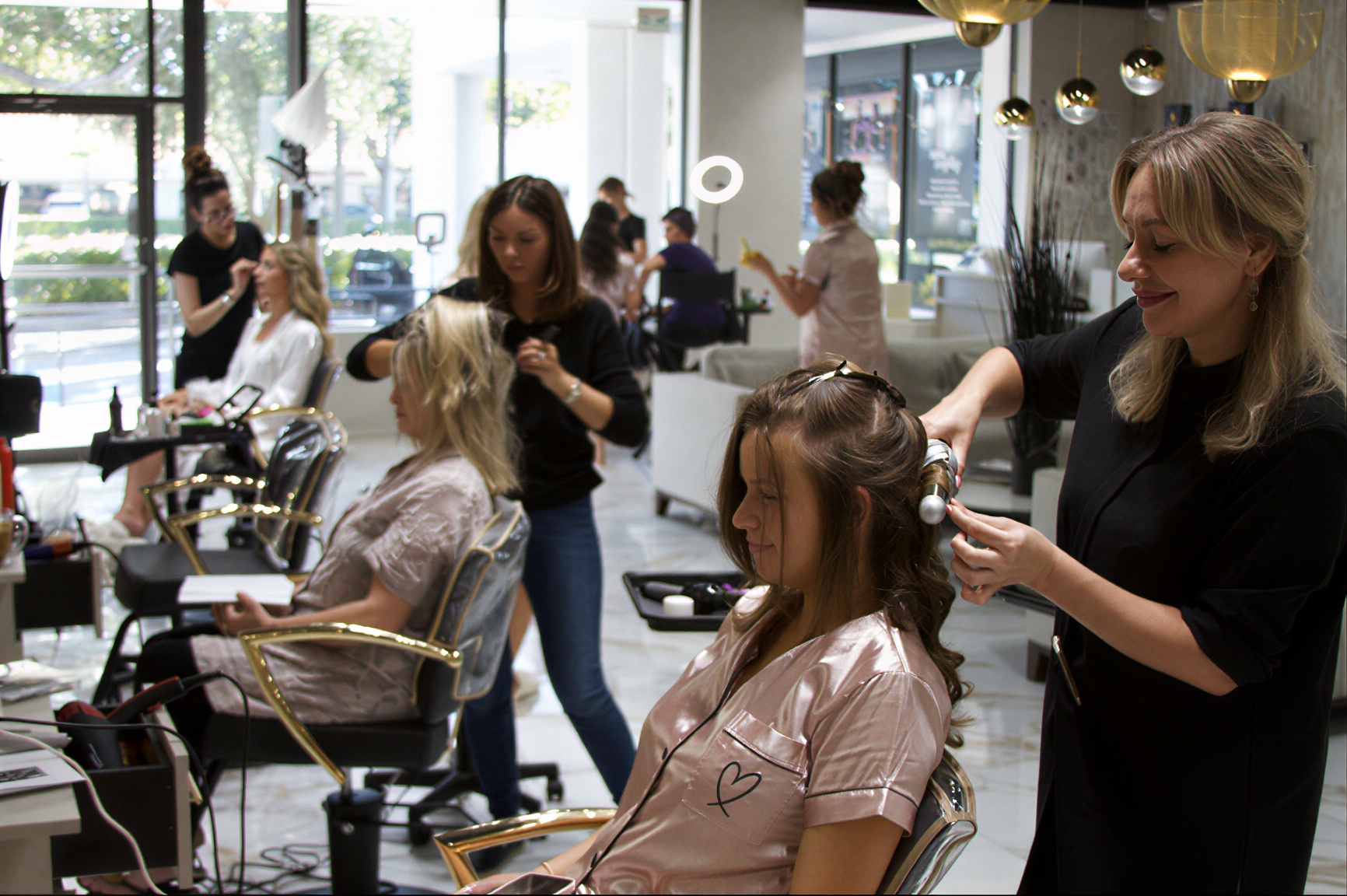 Luxury Hair Salon Boca Raton | Hair, Makeup, Nails and Extensions 10 Stylists working with clients at Hairmess Salon in Boca Raton