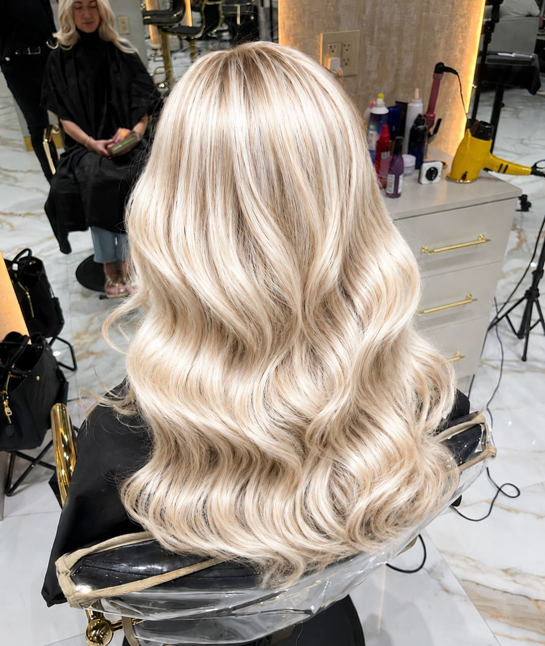 Blonde Specialist Delray Beach 2 Bright blonde waves by a Blonde Specialist Delray Beach clients visit at Hairmess Salon